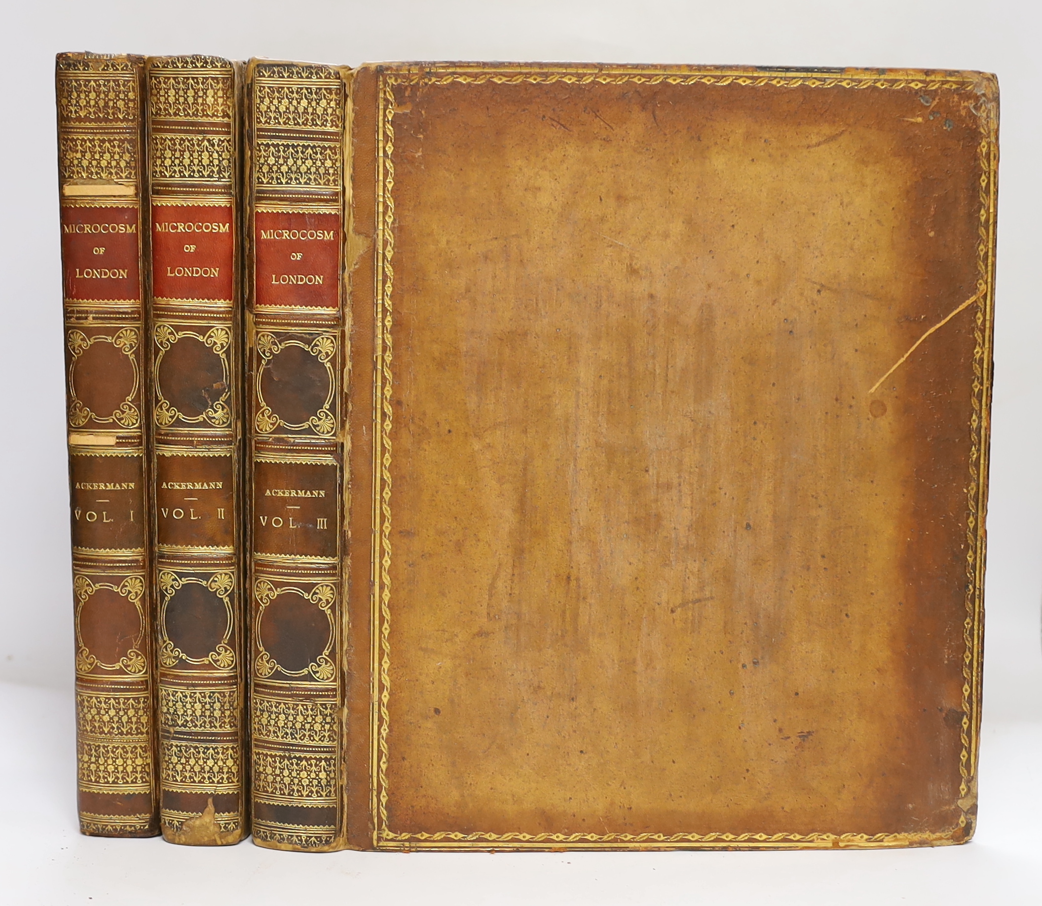 Ackermann (Rudolph, publisher) - The Microcosm of London, 3 vols, 1st edition, folio, calf gilt, rebacked, with wood-engraved titles and engraved dedication leaves, 104 hand-coloured aquatint plates after Rowlandson and